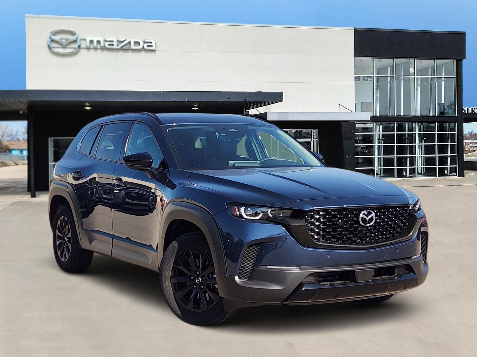 2026 Mazda Mazda CX-50 Hybrid Premium in Ingot Blue Metallic — front three-quarter view