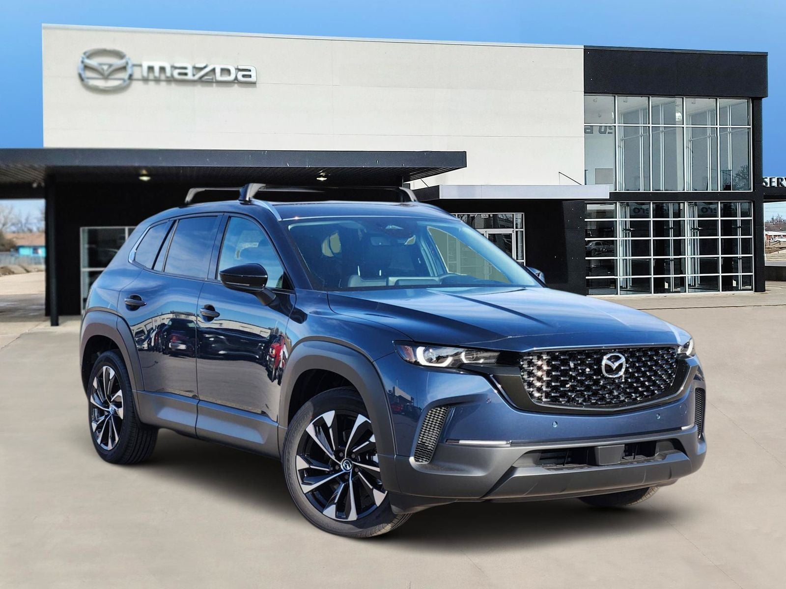 2026 Mazda Mazda CX-50 Hybrid Premium Plus in Ignot Blue Metallic — front three-quarter view