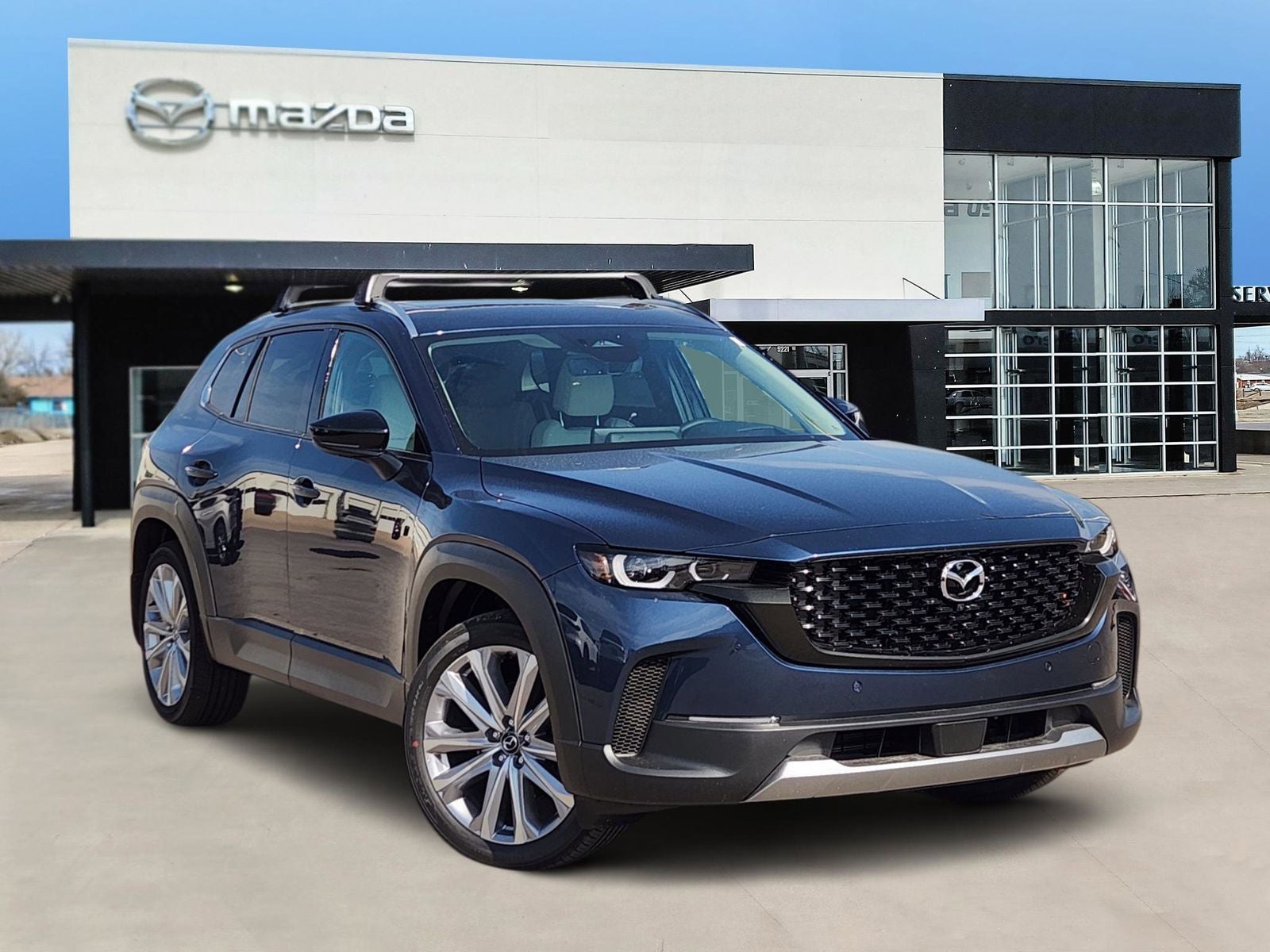 2026 Mazda Mazda CX-50 2.5 Turbo Premium Plus in Ingot Blue Metallic — front three-quarter view