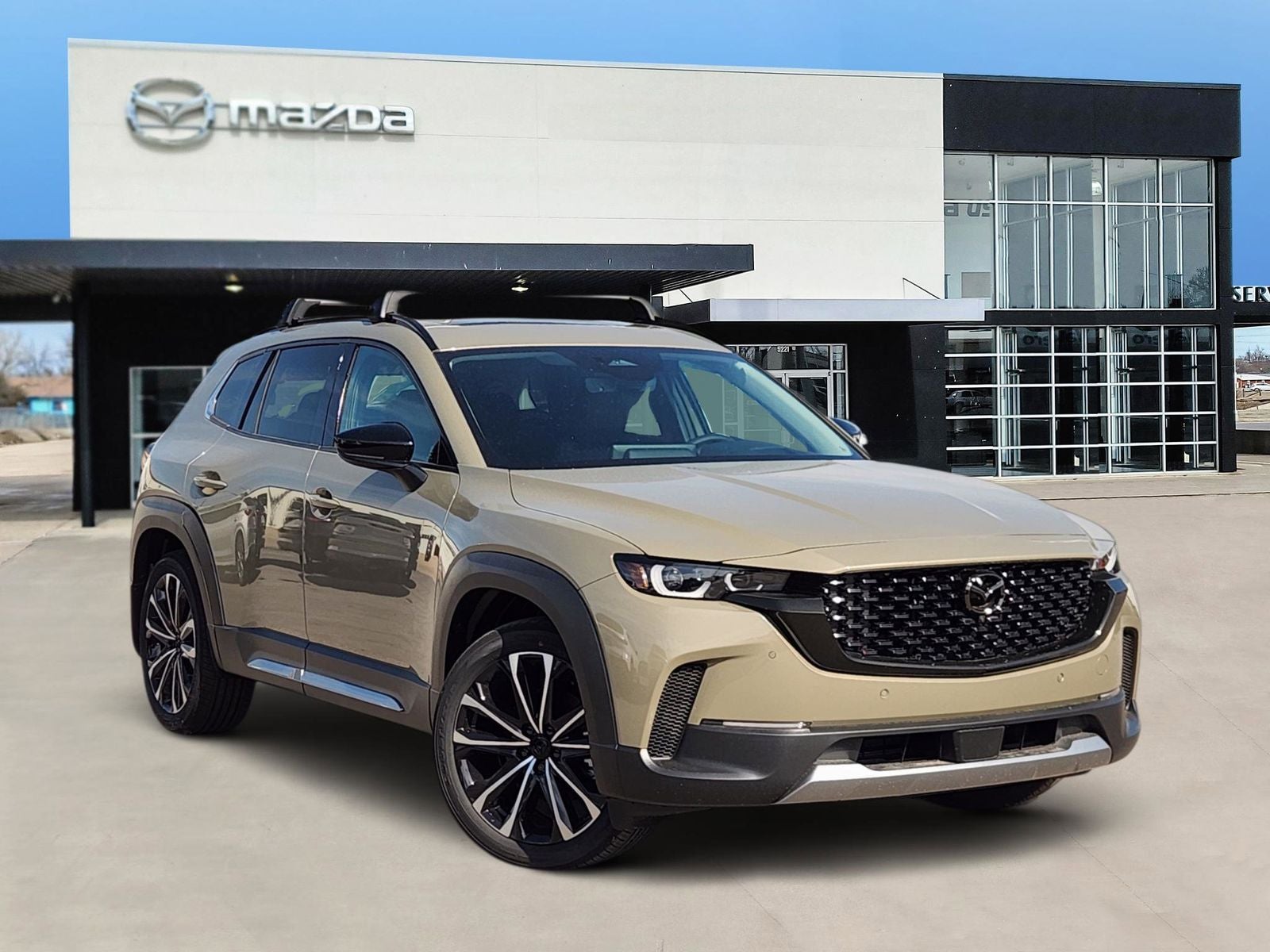 2026 Mazda Mazda CX-50 2.5 Turbo Premium Plus in Zircon Sand Metallic — front three-quarter view