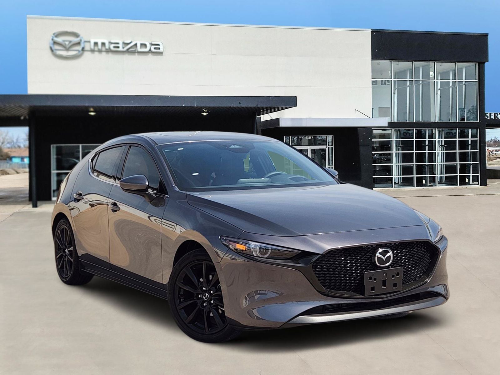 2026 Mazda Mazda3 Hatchback 2.5 S Premium in Machine Gray Metallic — front three-quarter view