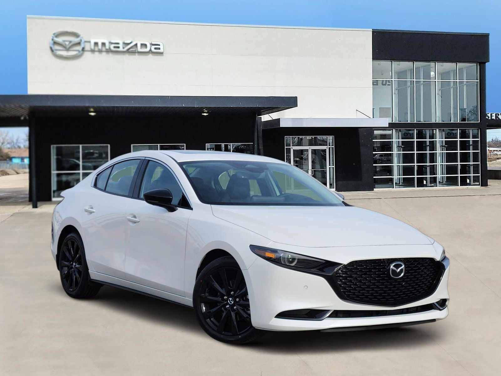 2026 Mazda Mazda3 Sedan 2.5 Turbo Premium Plus in Snowflake White Pearl Mica — front three-quarter view