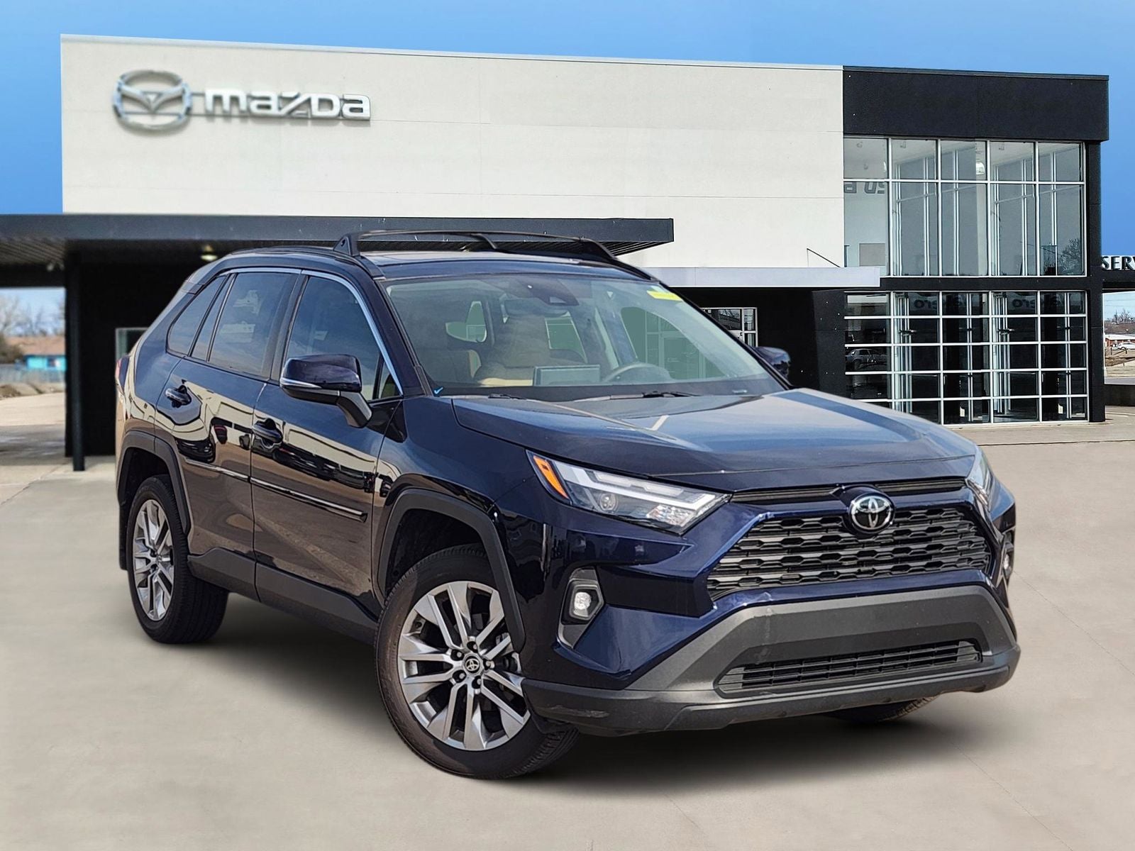 2025 Toyota RAV4 XLE Premium in Blueprint — front three-quarter view