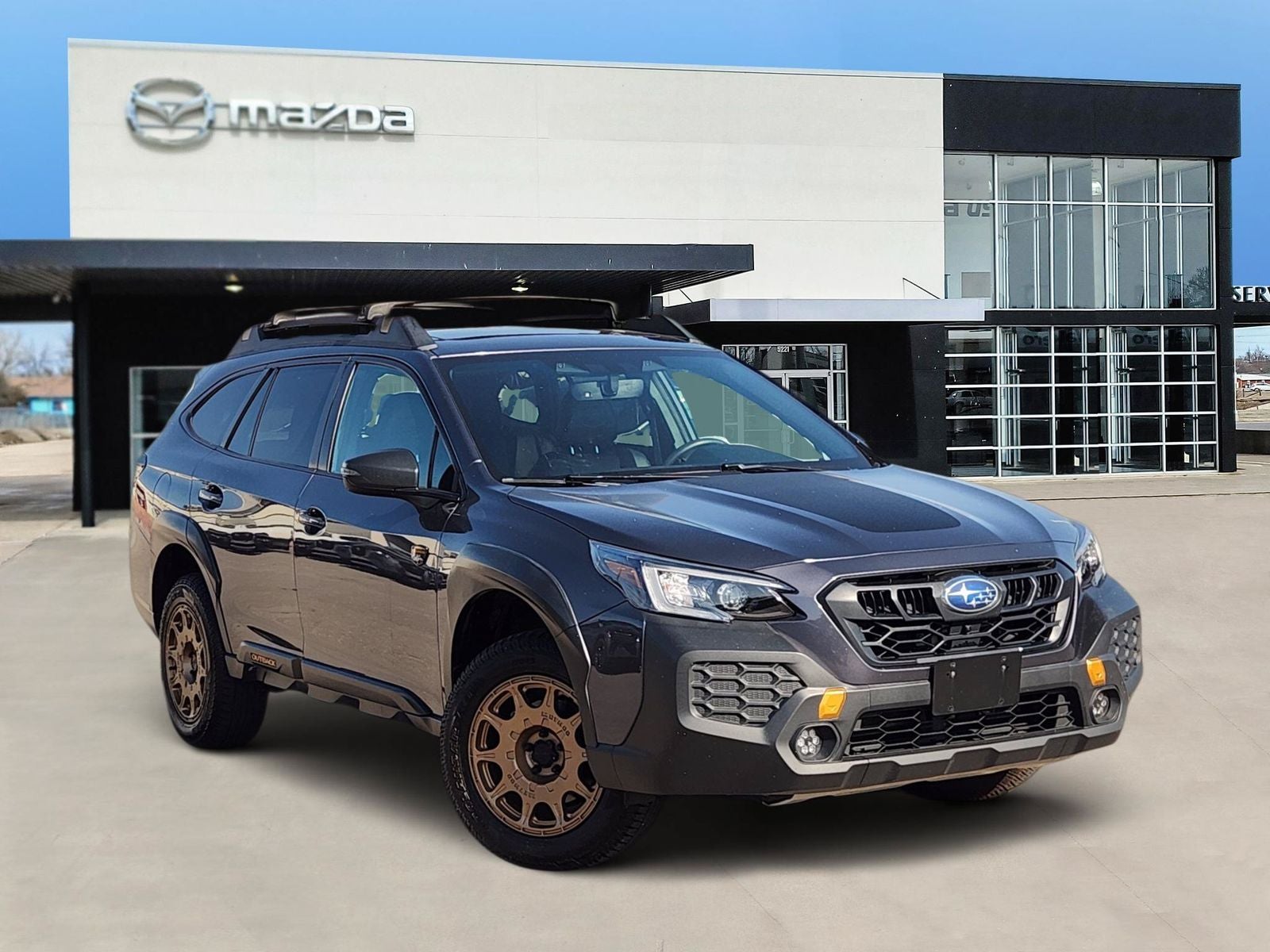 2024 Subaru Outback Wilderness in Magnetite Gray Metallic — front three-quarter view