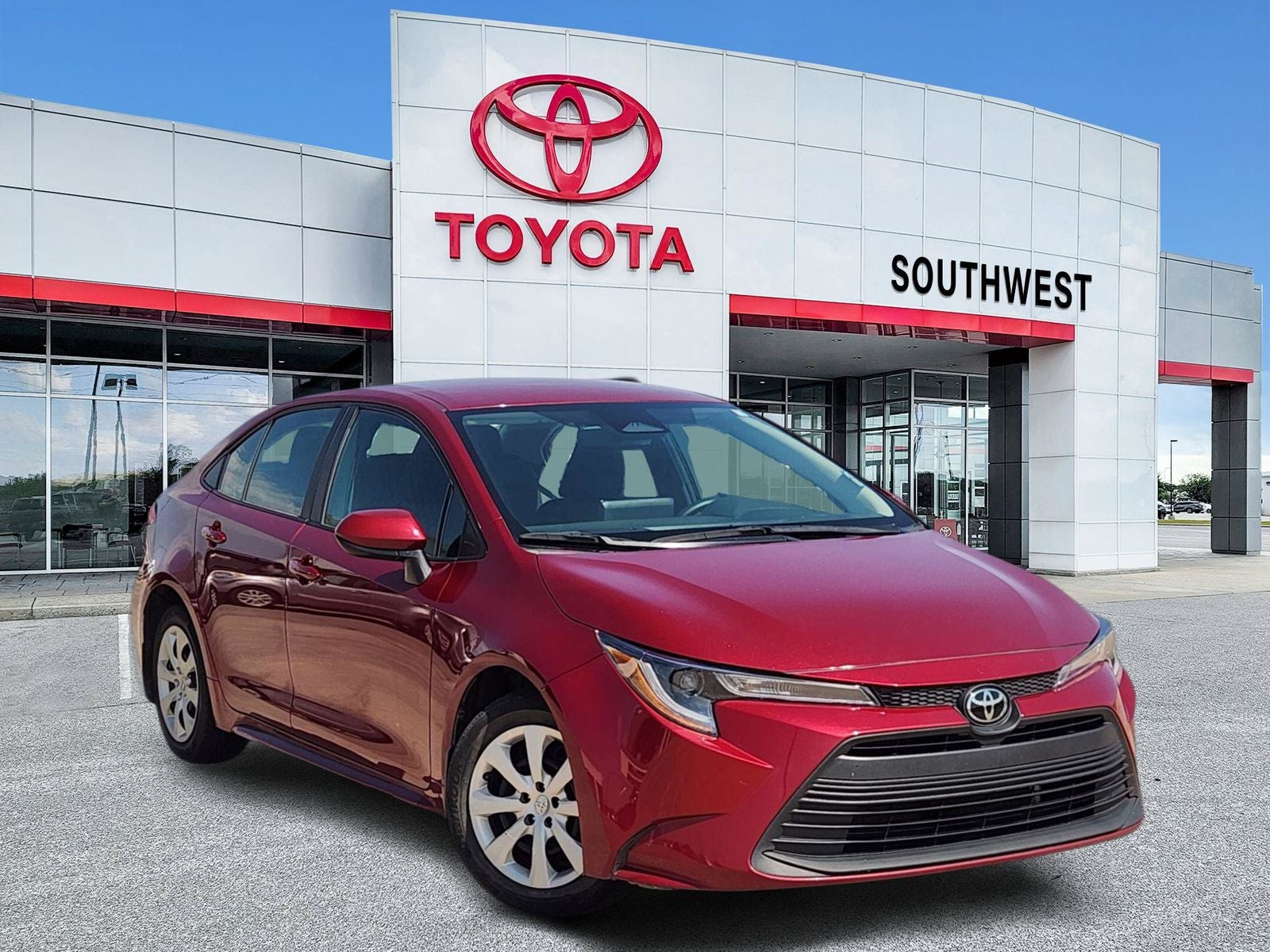 2024 Toyota Corolla LE in Pearl — front three-quarter view