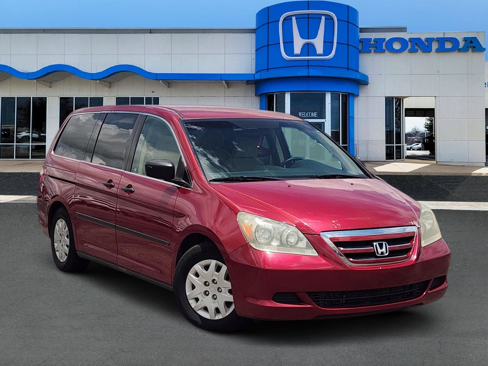 2006 Honda Odyssey LX in Tango Red Pearl — front three-quarter view