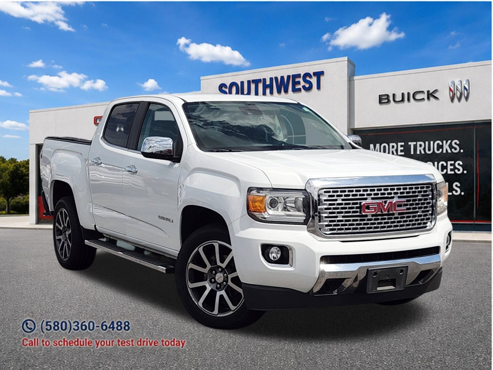 2020 GMC Canyon 4WD Denali in Summit White — front three-quarter view